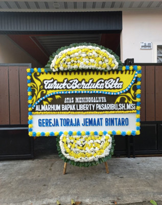 Papan Bunga Duka di Wek Iv